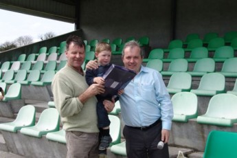 Gerry Moran presents Cian Burke with his raffle prize